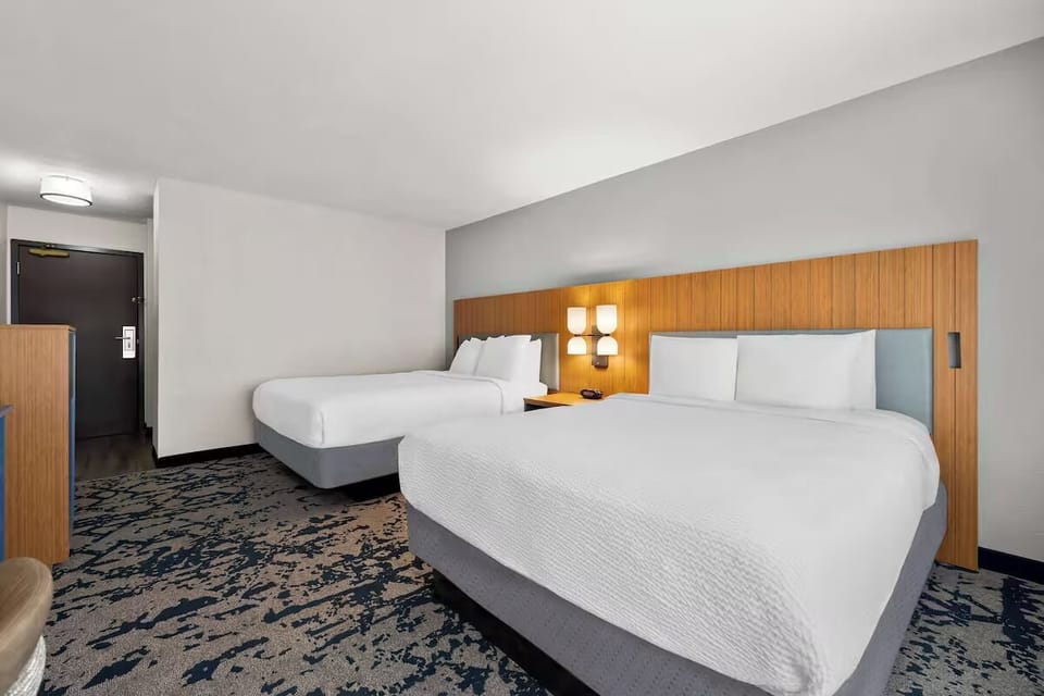 Recharge in a quiet, spacious room with plush bedding.