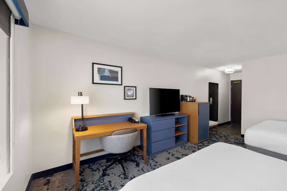 Recharge with easy entertainment, storage, and a practical work zone.