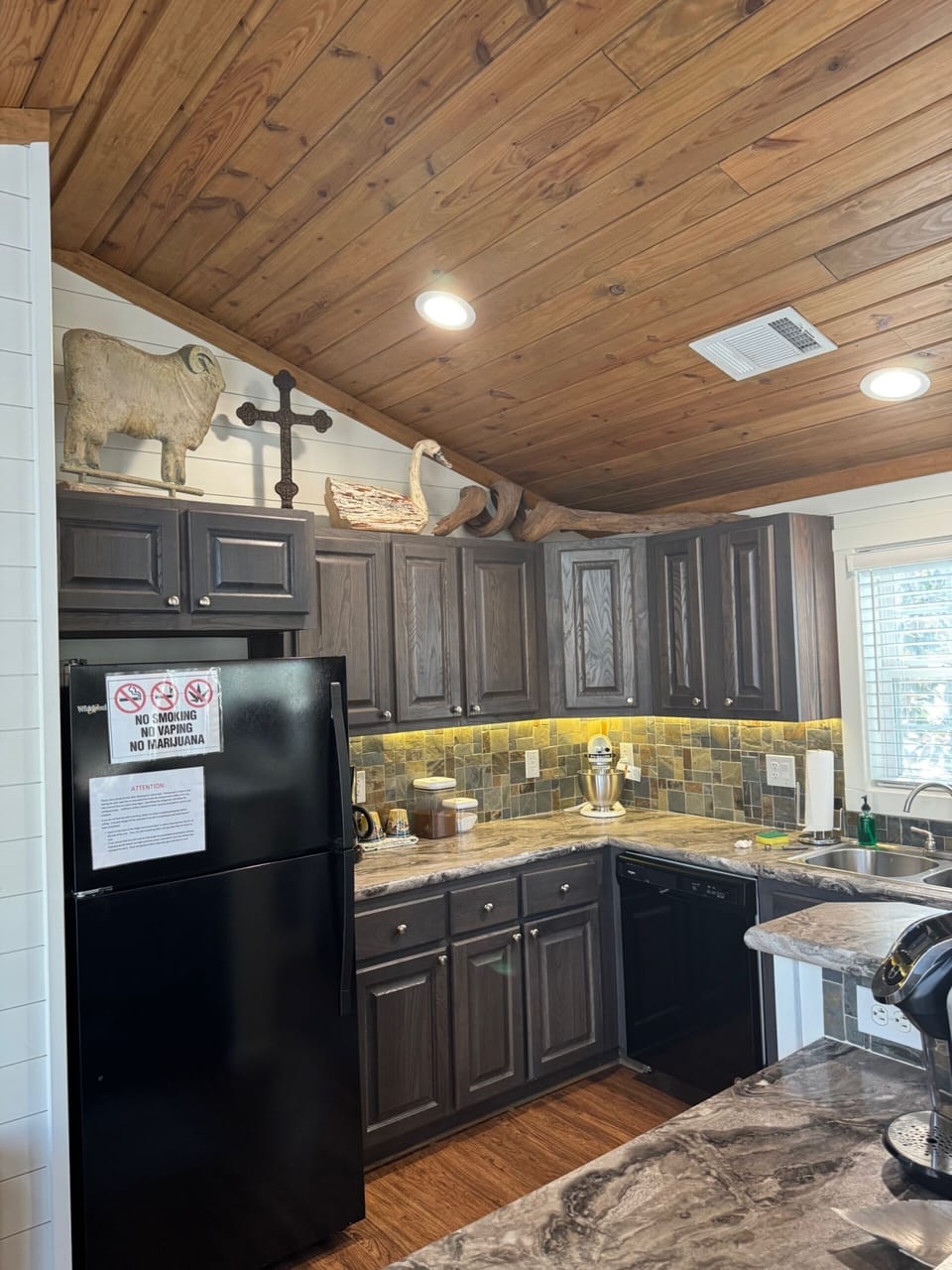 Compact kitchen with stone counters