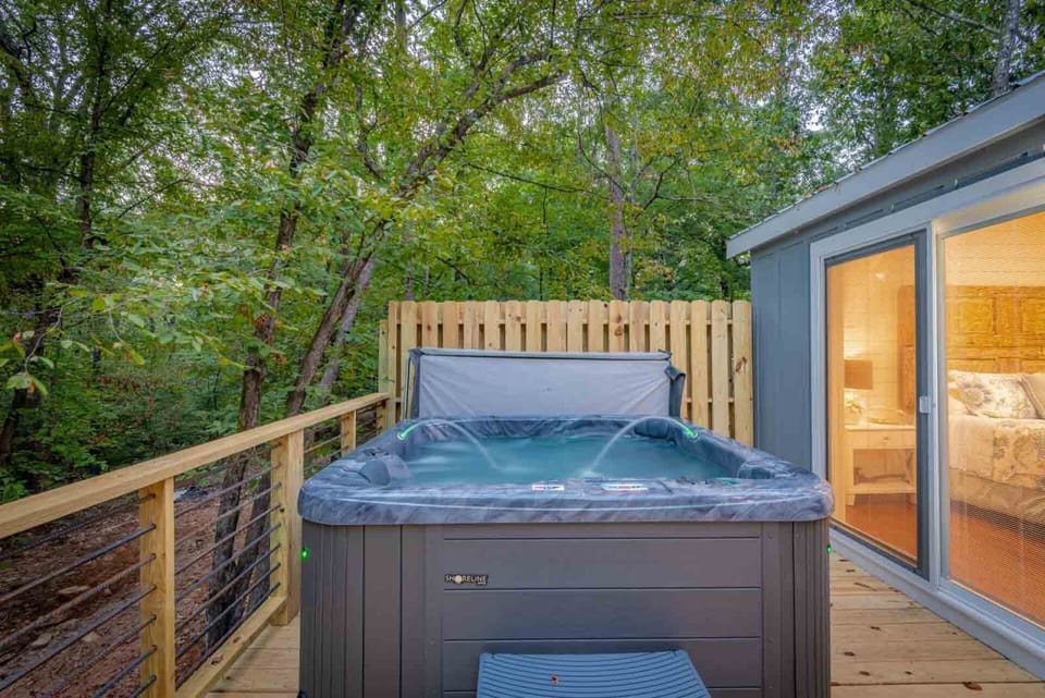 Private hot tub on wooded deck
