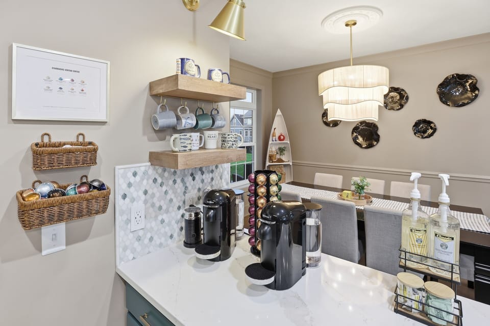 Wake up to this coffee bar!!  With two Nespresso machines- noone ever has to wait for their caffeine kick.  Complimentary pods and supplies...serving up coffee 24/7