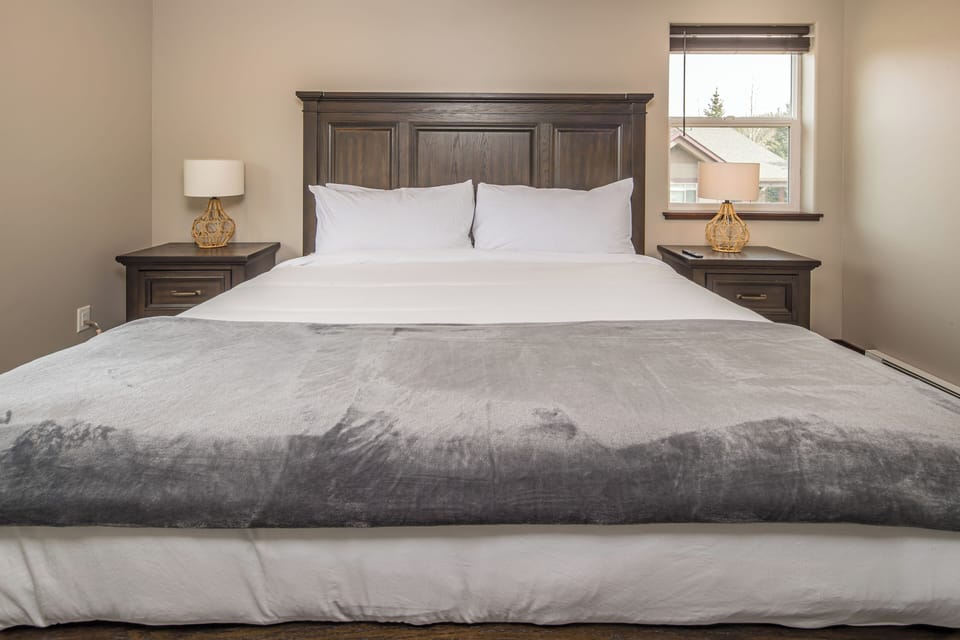 Snuggle into this soft, plush king-sized bed | Upper Level