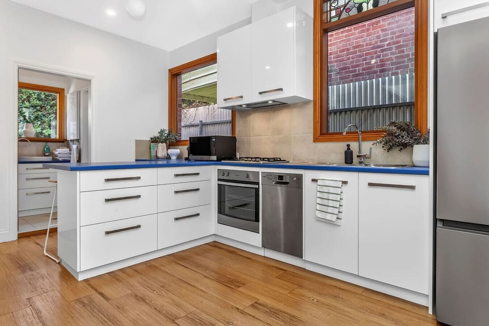 Well-equipped kitchen with modern appliances and ample bench space.