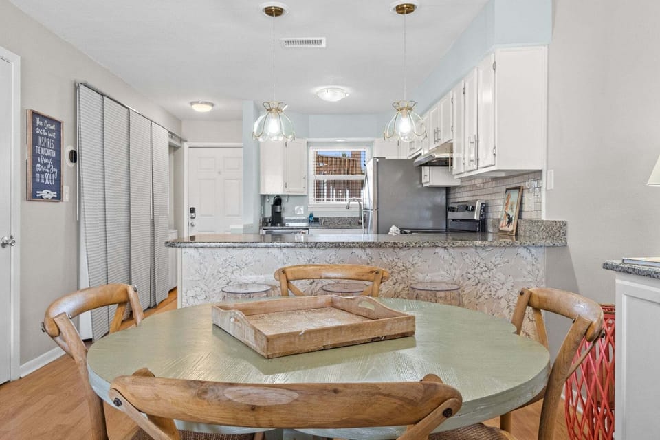 Dining for 4 ~ Open to Kitchen & Living Room ~ Extra Seating at the Kitchen Bar