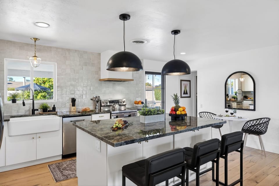 Large island with bar seating, perfect for morning coffee or entertaining.