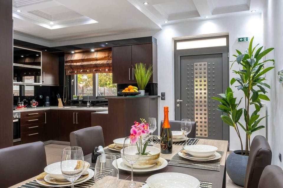 Savor a delicious home-cooked meal in our contemporary dining area, designed for comfort and style.