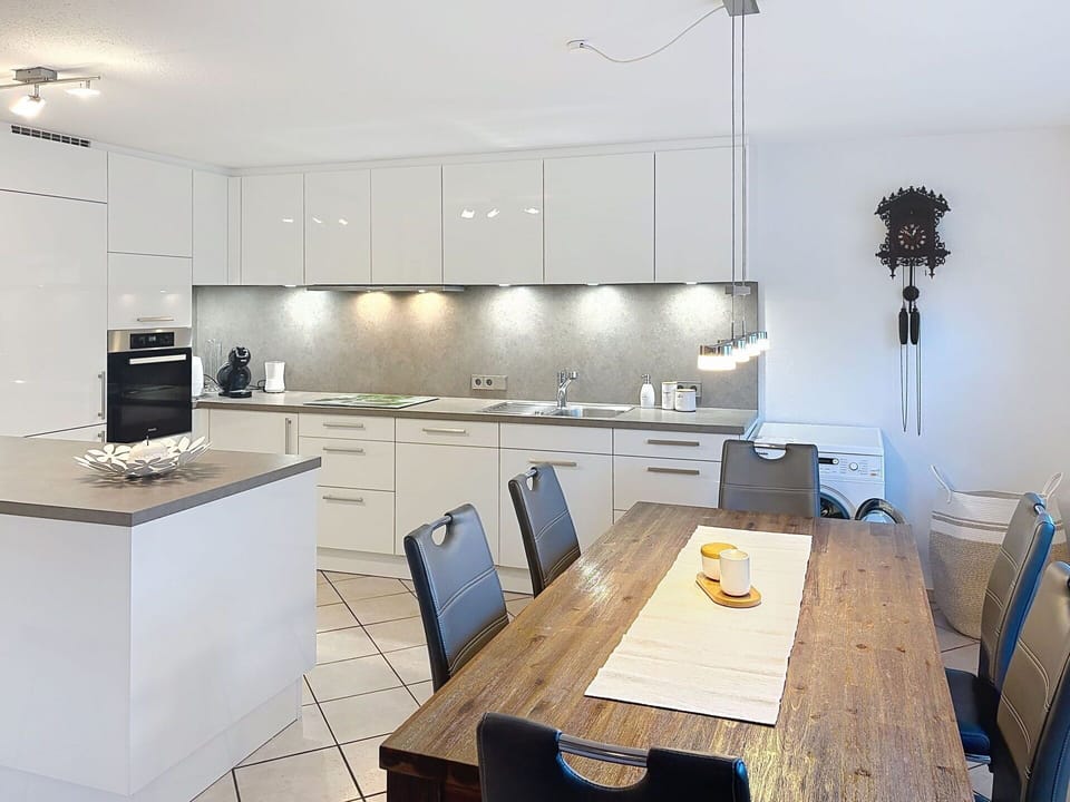 Kitchen, Furniture, Countertop, Interior Design, Flooring, Kitchen Appliance, Cabinetry, Wood, Light Fixture, Floor