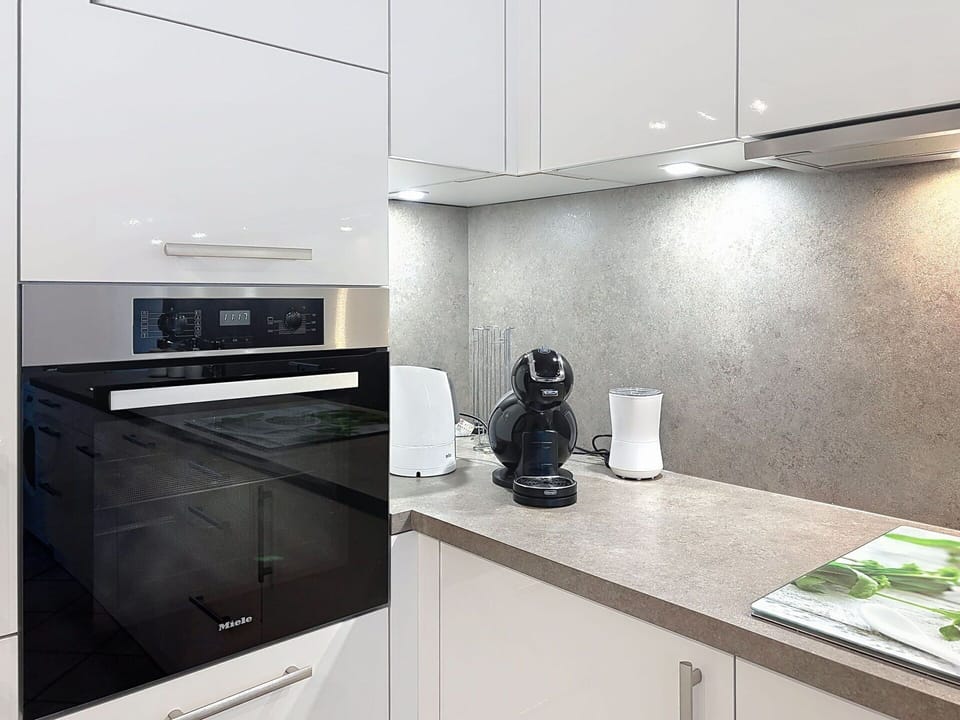 Kitchen Appliance, Cabinetry, Wood, Interior Design, Flooring, Home Appliance, Major Appliance, Kitchen, Countertop, Drawer