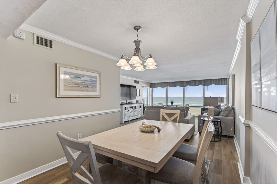 Seamless flow from dining to oceanfront living.