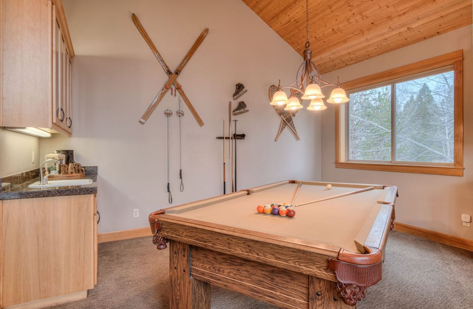 Pool table and wet bar area.