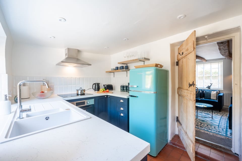 Ground floor: Kitchen with door to the sitting room