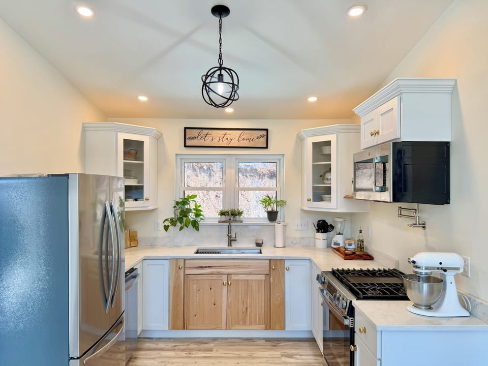 Fully equipped kitchen with modern appliances and everything you need for home-cooked meals.