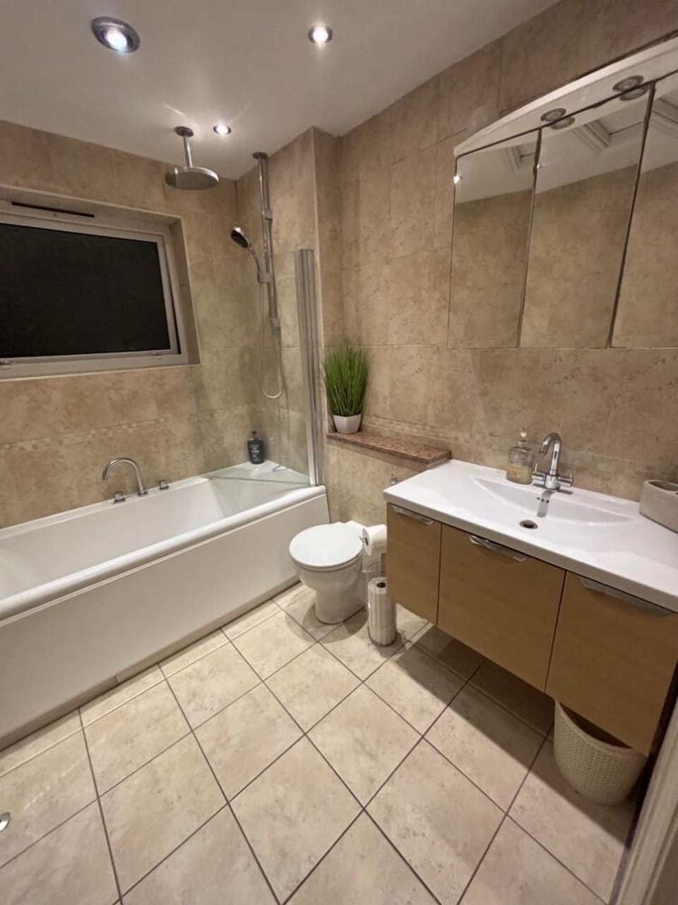 bathroom with rainfall shower