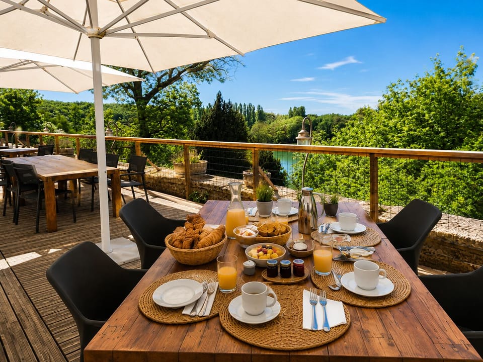 Brunch on the terrace protected by parasols