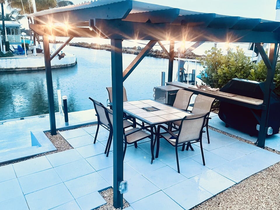 Pergola and grilling area with direct views of the Bay. 