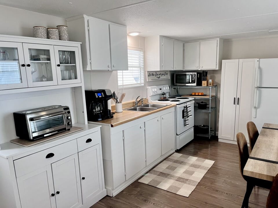 Kitchen is fully equipped with everything you need. 