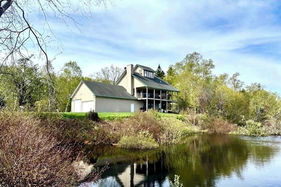 Exterior back yard with beautiful pond