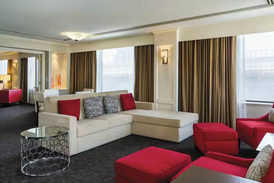 Gather and lounge together in a spacious, stylish suite living area.