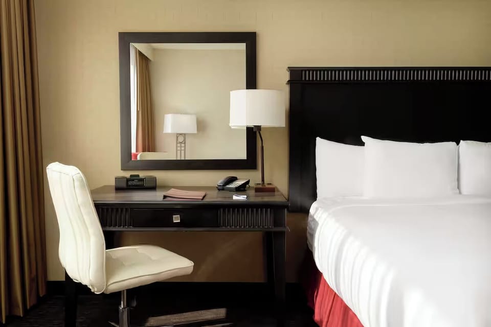 Settle in and catch up comfortably at the in-room desk.