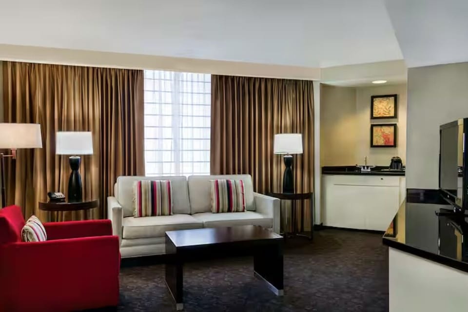 Settle in with a cozy lounge and handy kitchenette.