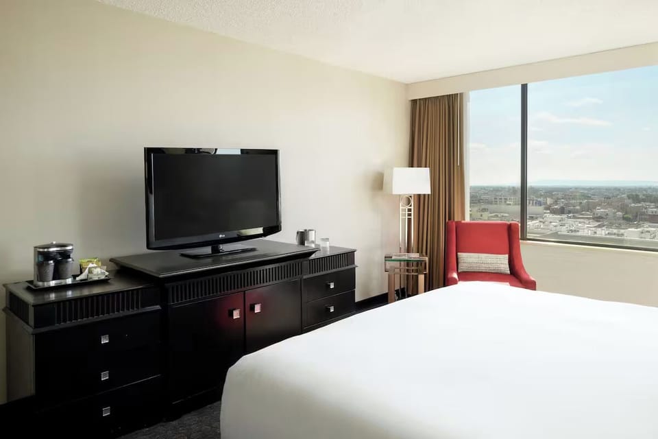 Wake up to sunlit views and relax with in-room entertainment.