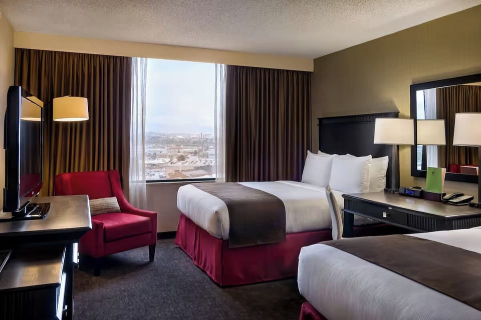 Stretch out in a spacious double room with calming city views.