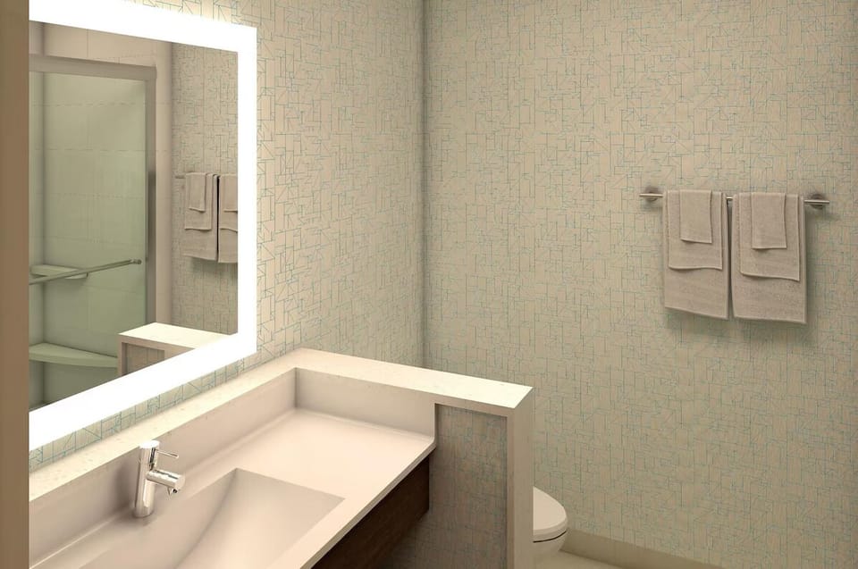 Start your day in a spotless bath with glowing mirror light.