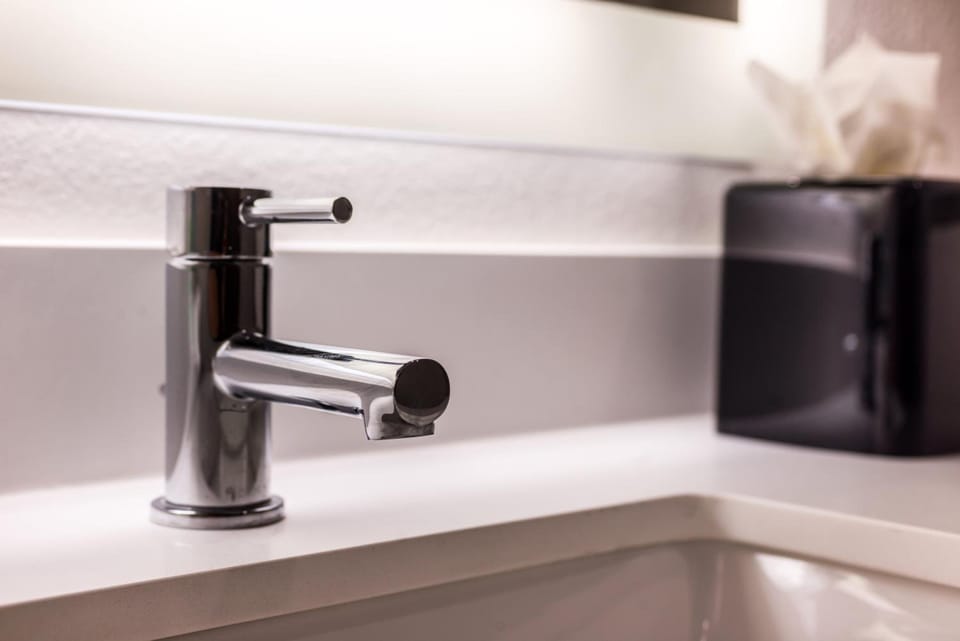 Admire sleek fixtures and sparkling surfaces for a polished feel.