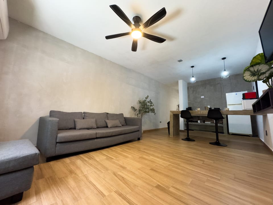 Spacious living area with modern comfort and sleek design