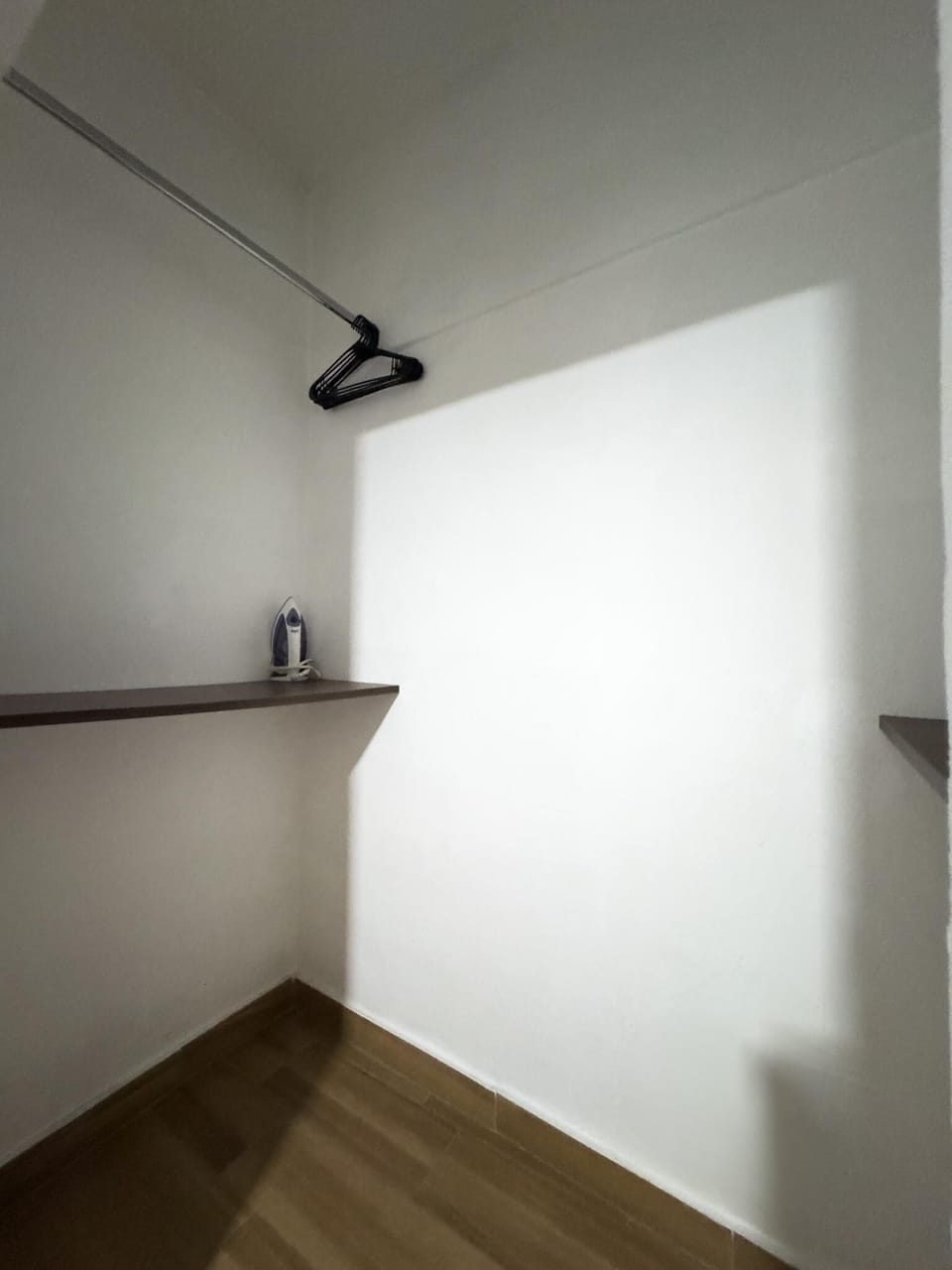 Cozy, minimalist nook with natural light and wooden accents