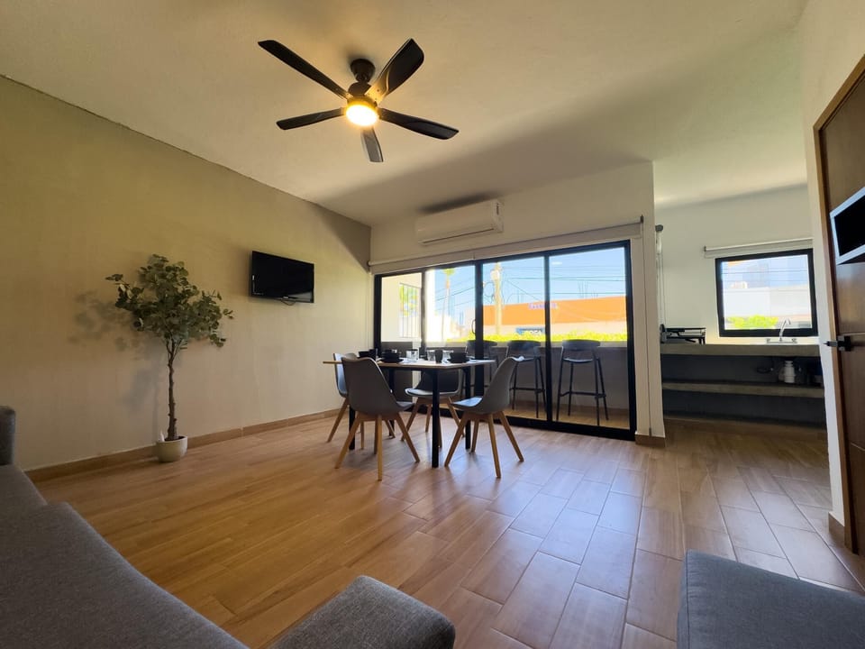 Sunlit dining area with scenic views and modern comfort