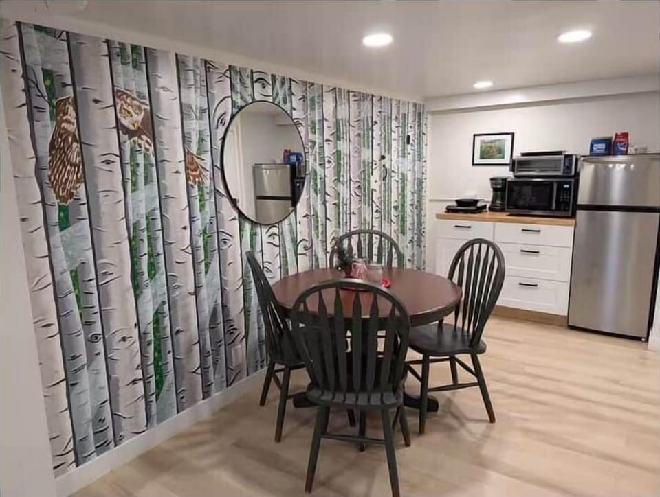 Kitchen and dining table with custom mural