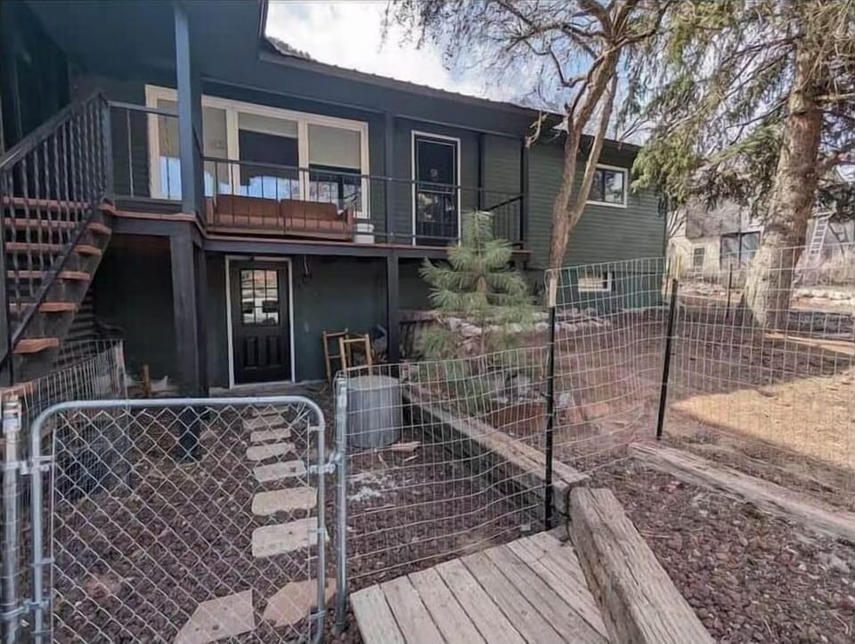 Front of Parker's Den with Fenced yard