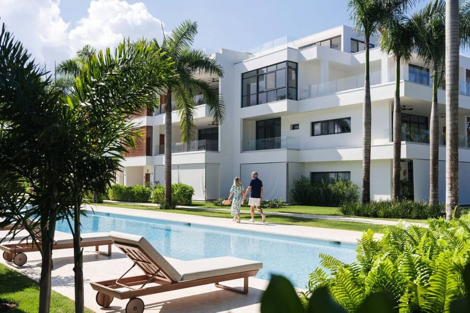 Sol de Arena Residences pool area just steps away, with plenty of loungers and a relaxed setting to enjoy your time outdoors.