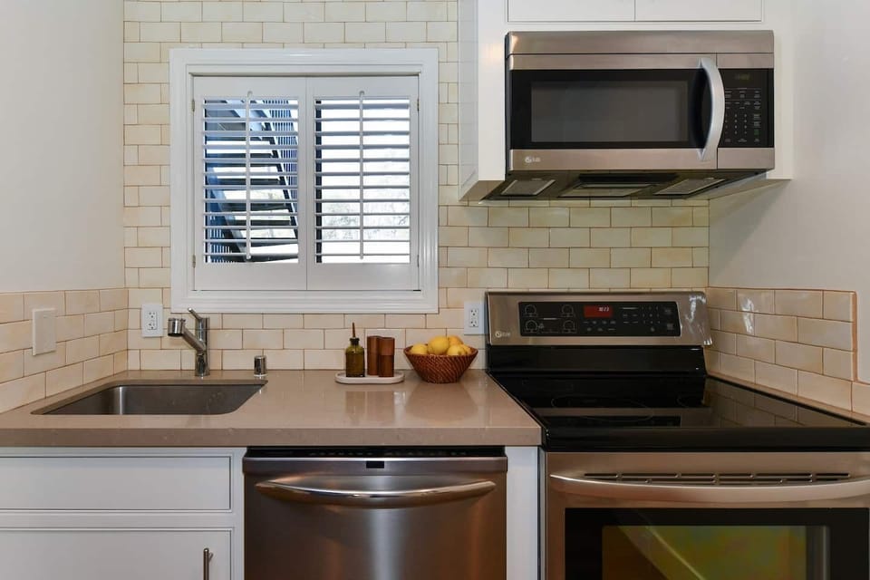 Dishwasher, Microwave, Stove, Oven. Olive Oil & Vinegar provided.