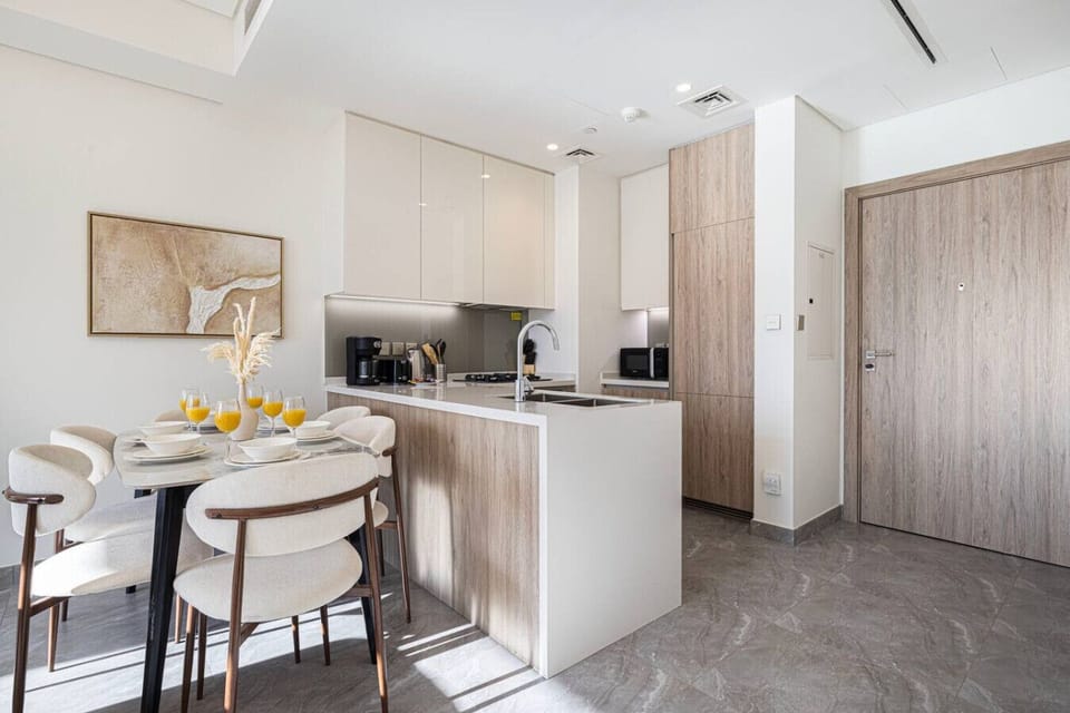 ✨ “Bright, modern kitchen and dining space designed for relaxed meals and easy living.”