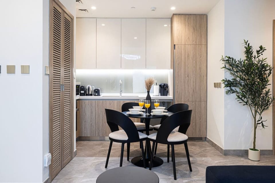 Stylish dining nook and fully equipped kitchen designed for comfort and convenience.
