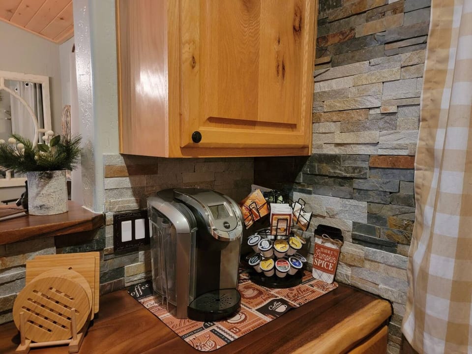 Keurig coffee provided with creamer and sweetener. Teas as well. 