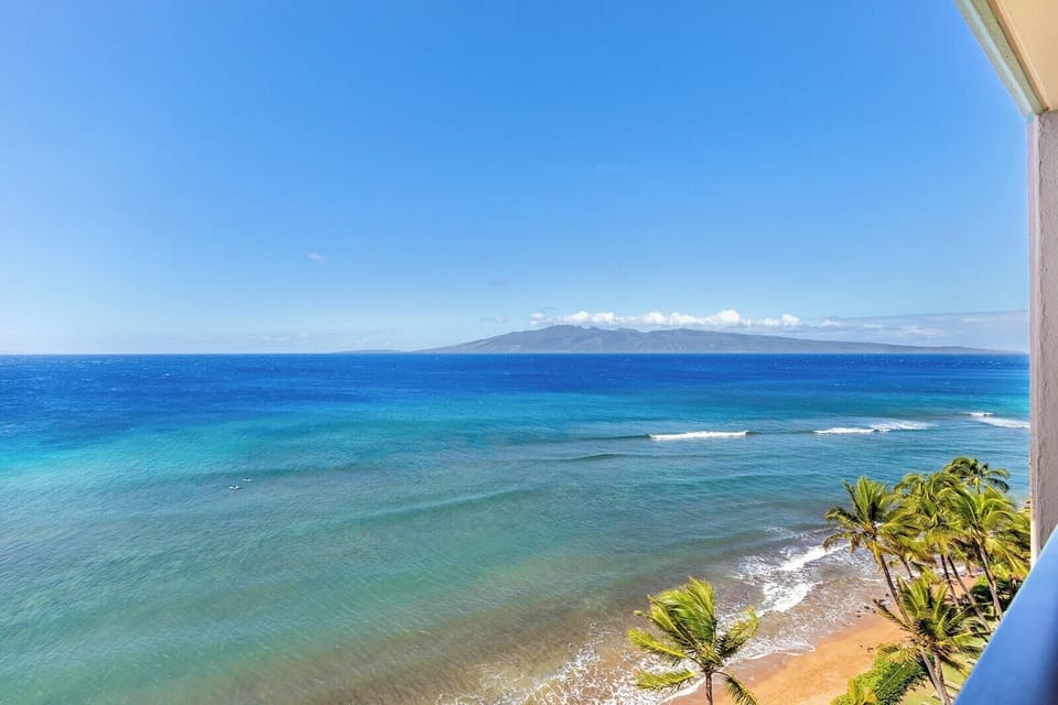 Float above the shoreline where emerald tides meet golden sand—your daily view is a watercolor of the sea MAH-1211