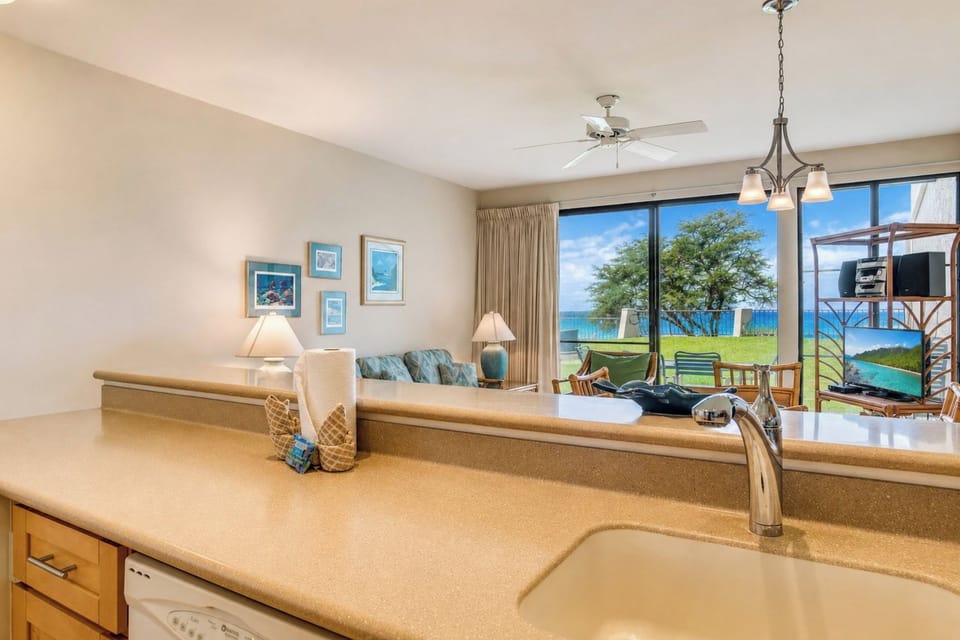 Casual dining space for shared vacation meals while enjoying an ocean view NAP-B42