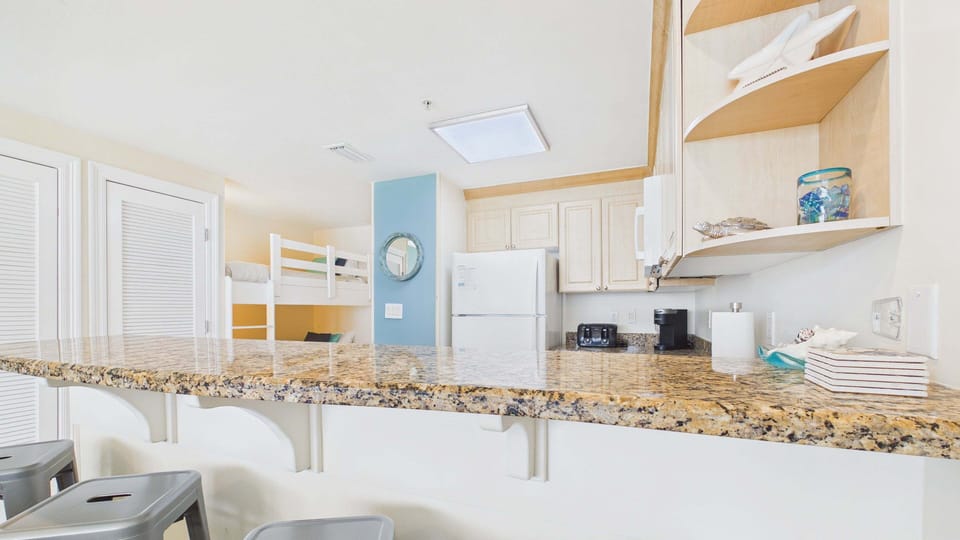 Breakfast bar seating attached to kitchen counter makes for better mornings