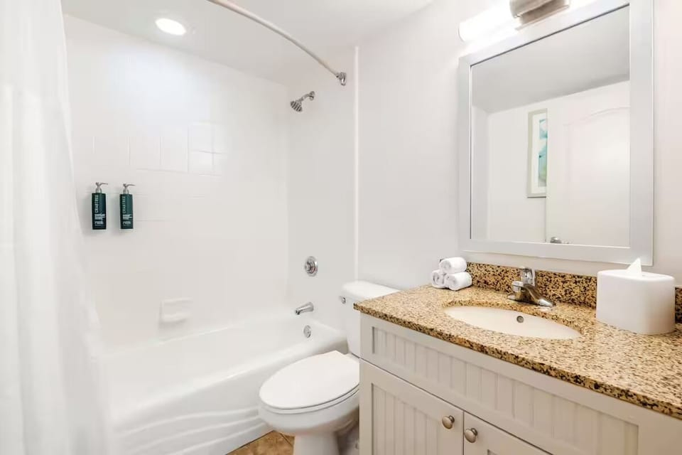 Refresh after the beach with a bright bath and tub shower.