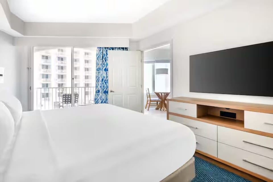 Wake up to balcony light and stretch out in comfort.