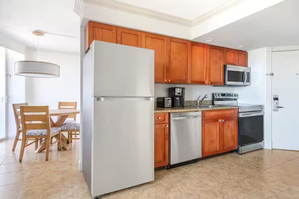 Cook easy meals with full kitchen and casual dining.