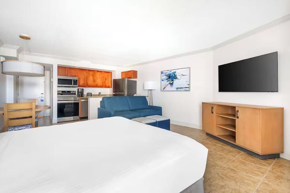 Lounge comfortably with sofa seating and entertainment at hand.