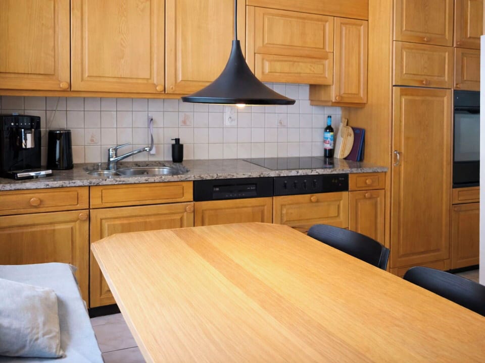 Interior Design, Flooring, Wood, Furniture, Countertop, Cabinetry, Floor, Kitchen, Lighting, Brown