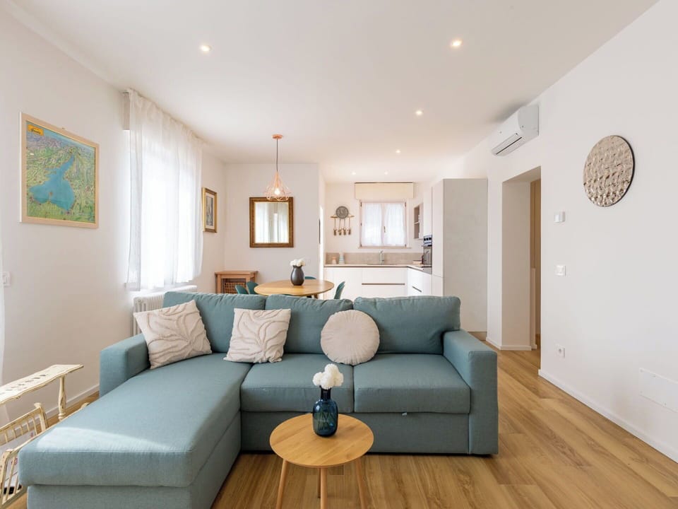 Furniture, Interior Design, Flooring, Couch, Floor, Room, Wall, Table, Wood, Living Room