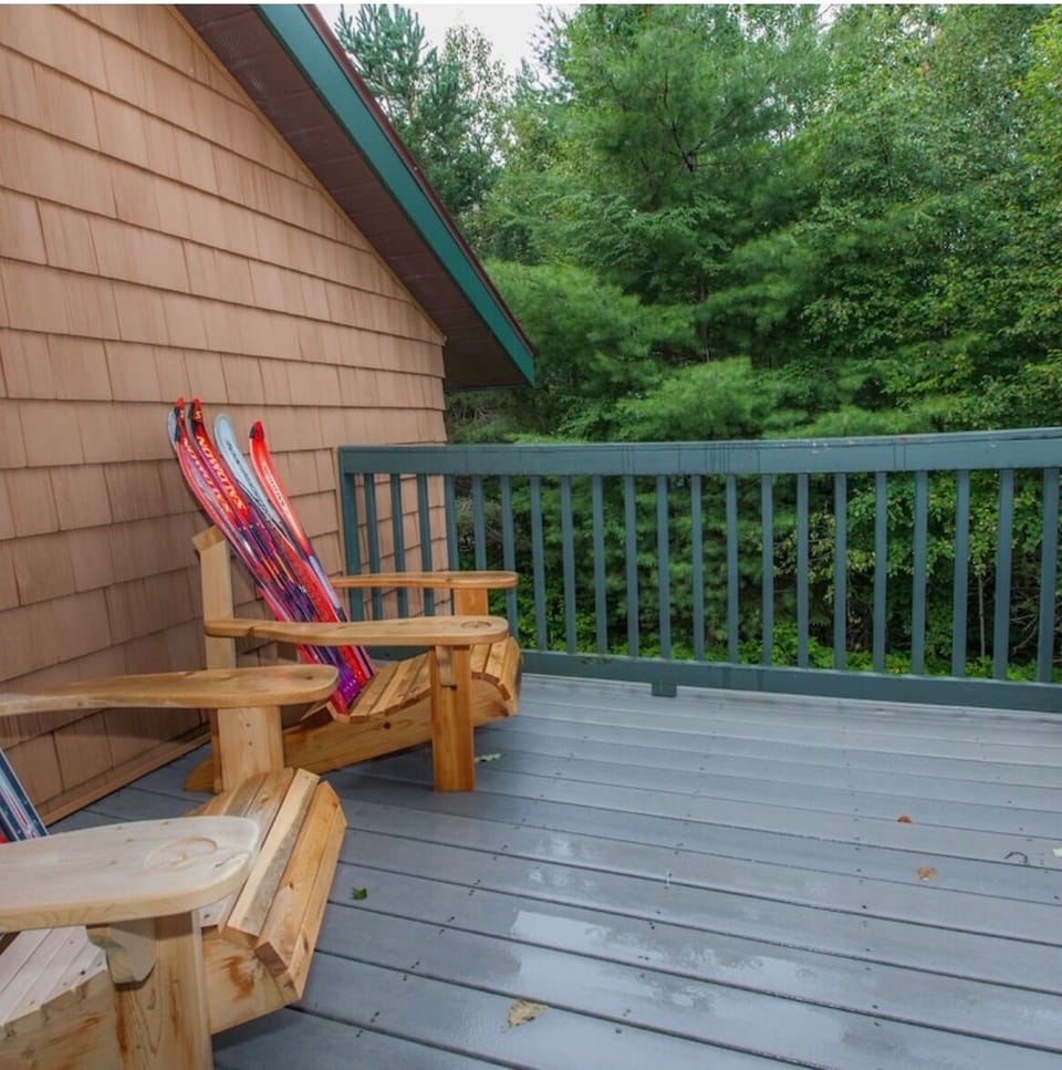 2nd floor patio with custom Adirondack ski chairs