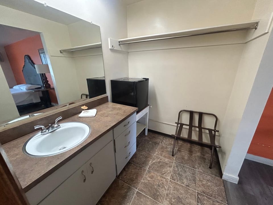 Refresh at the roomy vanity with plenty of counter space.