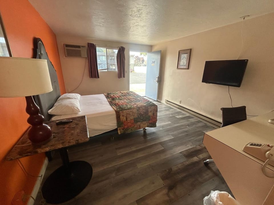 Settle into a simple room with easy outdoor access.